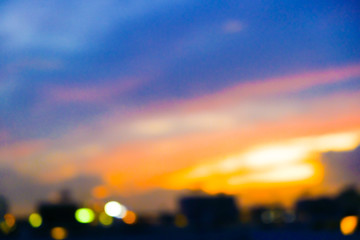 Blurred colorful sunset sky cloud with city building