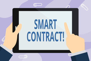 Obraz na płótnie Canvas Handwriting text writing Smart Contract. Conceptual photo the computer protocol running on top of a block chain Businessman Hand Holding, Pointing and Touching Colorful Tablet Blank Screen