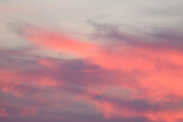 Sunset sky with bright colors of pink, blue, purple.