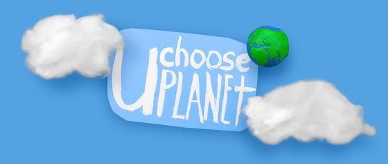 Plasticine Earth planet handmade, clouds and sticker with ecology text. Ecology Concept for Earth Hour, Earth Day, Ocean Day and other ECO dates.