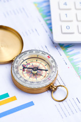 compass, calculator on financial graph, Business investment concept