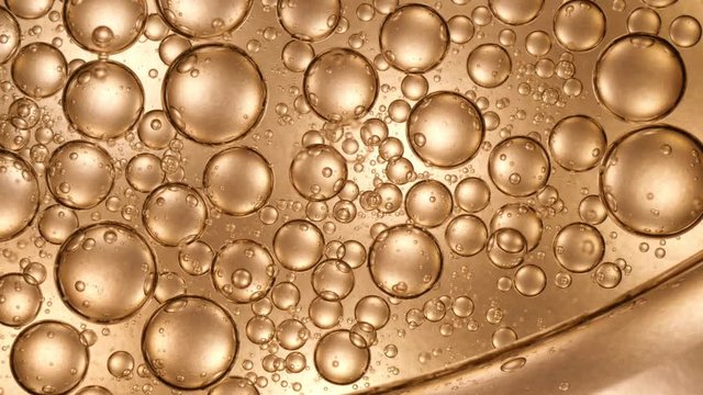 Golden luxury bubbles abstract background 4K UHD video