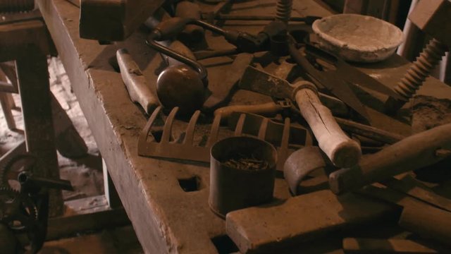 Old carpenter tools on a wooden table
