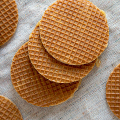 Homemade Dutch caramel waffles on cloth, top view. Top view, from above. Closeup.