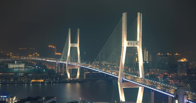 car traffic moving on multi row Spiral Nanpu bridge in the evening, Shanghai