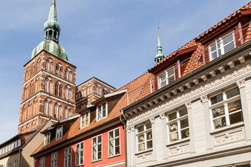 Fototapeta premium St. Nicholas Church with old houses. Stralsund, Germany