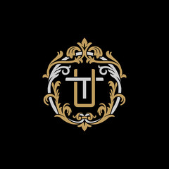 Initial letter T and U, TU, UT, decorative ornament emblem badge, overlapping monogram logo, elegant luxury silver gold color on black background