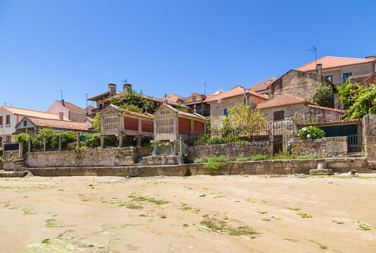 Combarro, Spain. The embankment of the old town with traditional horreo barns