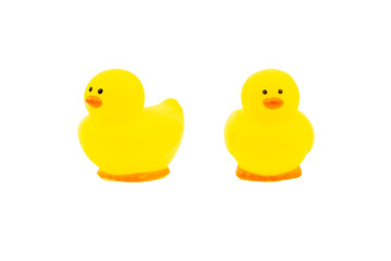 Yellow rubber duck on white background. Selective focus and copy space concept