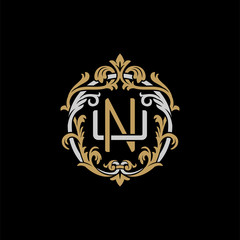 Initial letter U and N, UN, NU, decorative ornament emblem badge, overlapping monogram logo, elegant luxury silver gold color on black background