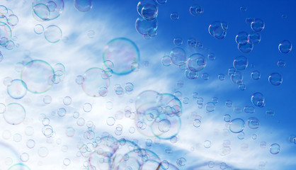 Soap bubble in the air with blue sky