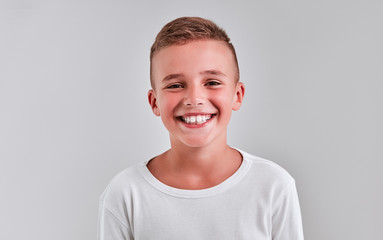 Cute boy on a gray background - Powered by Adobe
