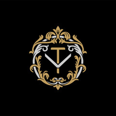 Initial letter V and T, VT, TV, decorative ornament emblem badge, overlapping monogram logo, elegant luxury silver gold color on black background