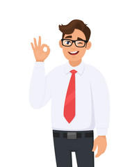 Portrait of a cheerful young business  man showing/gesturing/making okay or ok sign with hand and fingers while winking eye. Human emotions, facial expressions, feelings illustration in cartoon.