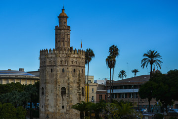 Fototapeta na wymiar The Golden Tower in Seville in the early morning.