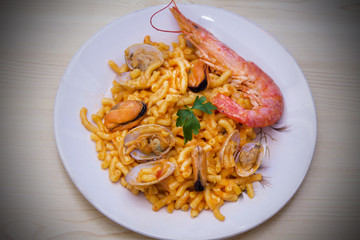 Fideua of seafood, clams, prawns and mussels