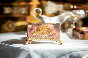 Chrismatory, chrismarium, jar for containing chrism oil. Sacrament. Baptism ceremony. Confirmation in Holy Spirit. Consecration. Ordination. Anointing. Myron. Holy anointing oil. Consecrated oil