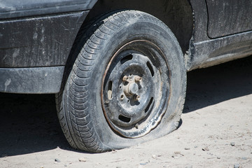 Flat tire while driving on the off-road.