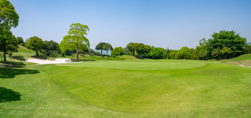 Panorama View of Golf Course with beautiful green. Golf is a sport to play on the turf.