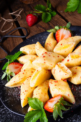 Kopytka - polish potato dumpling with strawberries