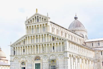 Facade of Pisa Cathedral, a Medieval Roman Catholic Cathedral in Italy