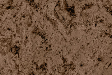Close up of abstract brown granite stone texture