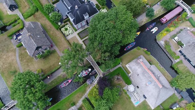 Aerial bird view of Giethoorn is a Dutch town in the province of Overijssel Holland and is located in the municipality of Steenwijkerland and is often referred to as Venice of the Netherlands 4k