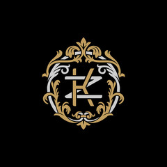 Initial letter Z and K, ZK, KZ, decorative ornament emblem badge, overlapping monogram logo, elegant luxury silver gold color on black background