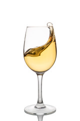 White wine in a glass with splashes isolated on white background