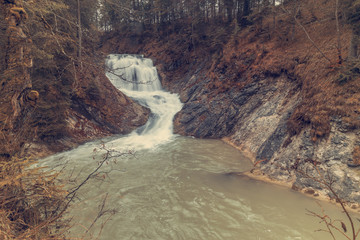 Waterfall in the forest in autumn