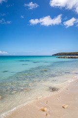 An idyllic sandy beach on the Caribbean Island of Antigua