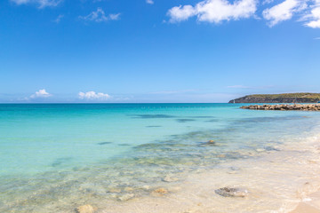 An idyllic sandy beach on the Caribbean Island of Antigua