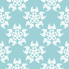 Fototapeta na wymiar White flowers on blue seamless background. Floral pattern