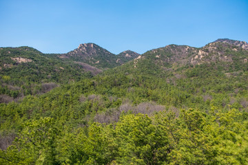 Fototapeta na wymiar panorama view of mountain hill and blue sky