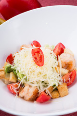 Seafood caesar salad with grilled shrimps