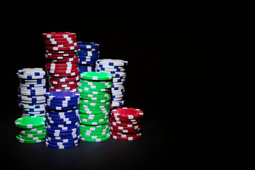 Poker chip on black background