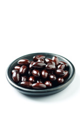Vitamin C with Bioflavonoids and Rose Hips. White background. Close up. Copy space.  