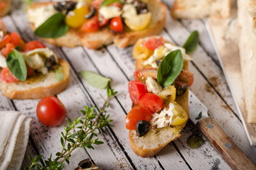 Crostini with tomatoes and olives