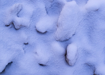 pile of melting ice blocks cowered with snow. seasonal, background, nature.