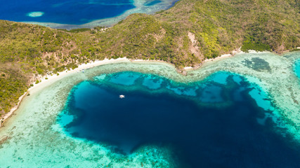 Islands of the Malayan archipelago with turquoise lagoons. Nature of the Philippines, top view....