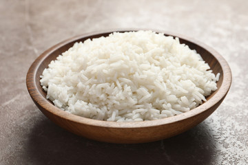 Fototapeta na wymiar Plate of tasty cooked white rice on table, closeup