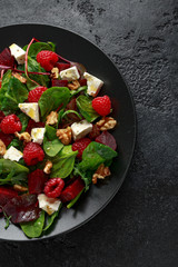 Healthy Beet Salad with raspberry, walnuts nuts and feta cheese