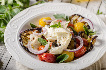 Grilled eggplant with tomatoes