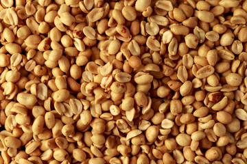 Roasted salted peanuts, pub snack. background, texture