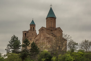 Fototapeta na wymiar orthodox church with grey sky background