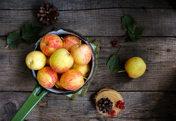 apples currant wooden background