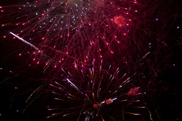 Fireworks in the night sky over the city