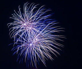 Fototapeta premium A fireworks sparks on a dark blue background, isolated