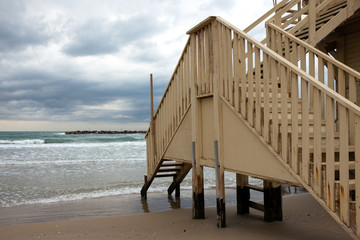 Closed lifeguard booth at empty beach in low season. Tel Aviv, Israel.