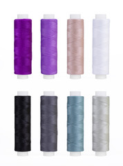 Set of sewing thread coils, miscellaneous colours, isolated on white